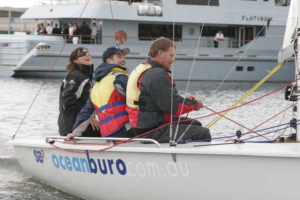 Sailing - Skandia Geelong Week 2009 - Media Launch, Docklands,  Melbourne (VIC) - 14/11/08  <br />
  <br />
Minister James Merlino pulls the strings, Sarah Blanck onboard SB3  <br />
 - 2009 Skandia Geelong Week launch © Teri Dodds http://www.teridodds.com